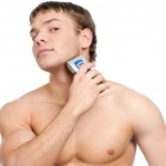 Man shaving with an electric shaver